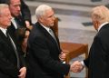 Trump, Pence shake hands at Carter funeral in first public meeting since leaving office
